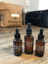 Load image into Gallery viewer, Organic rosehip face and body oil infused with 100% pure lavender essential oil and Rose Quartz crystals